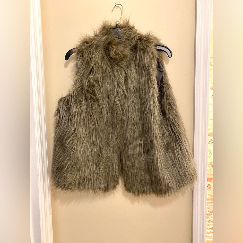 Faux fur vests. One with tag, never worn.